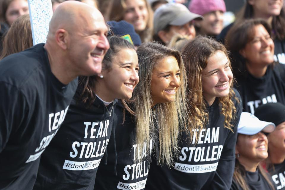 From left to right, John, Jackie, Abby and Lilly Stoller pose for a photo during the Walk MS event at Boston University on April 3, 2022. Abby, a 2017 Wayland High graduate and current Simmons College lacrosse player, was diagnosed recently with Multiple sclerosis (MS).