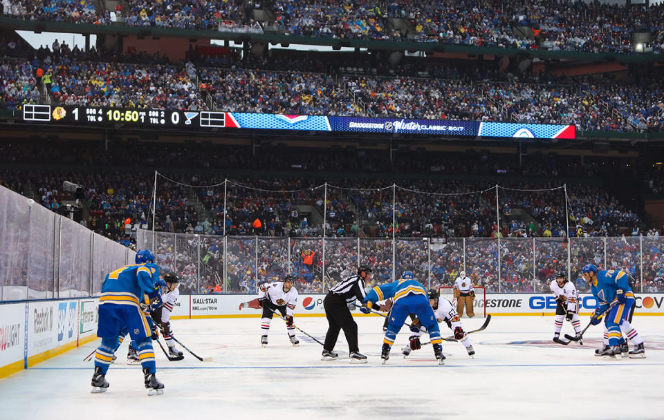 <p>ST LOUIS, MO – JANUARY 02: Tanner Kero #67 of the Chicago Blackhawks and Kyle Brodziak #28 of the St. Louis Blues face off in the first period during the 2017 Bridgestone NHL Winter Classic at Busch Stadium on January 2, 2017 in St Louis, Missouri. (Photo by Chase Agnello-Dean/NHLI via Getty Images) </p>