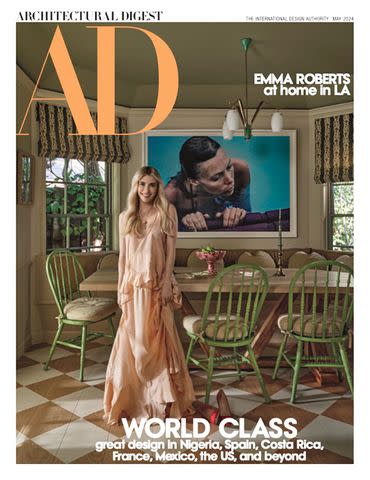 <p>Michael P. H. Clifford/Architectural Digest</p> Emma Roberts poses in her kitchen