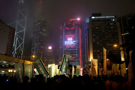 Pro-democracy activists attend an election campaign at the financial Central district in Hong Kong, China March 3, 2018. Picture taken March 3, 2018. REUTERS/Bobby Yip