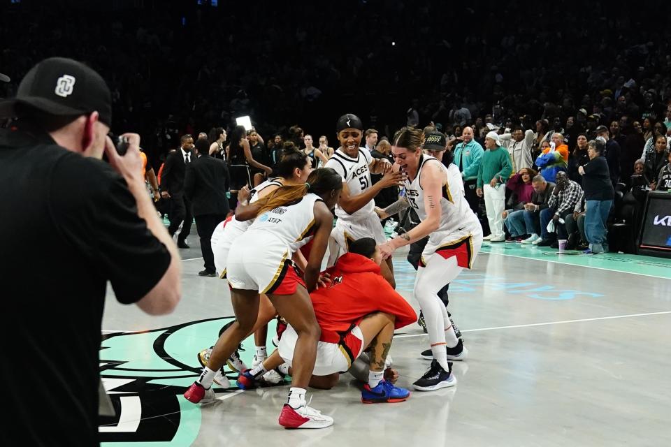 The Las Vegas Aces celebrates after Game 4 of a WNBA basketball final playoff series against the New York Liberty Wednesday, Oct. 18, 2023, in New York. The Aces won 70-69. (AP Photo/Frank Franklin II)