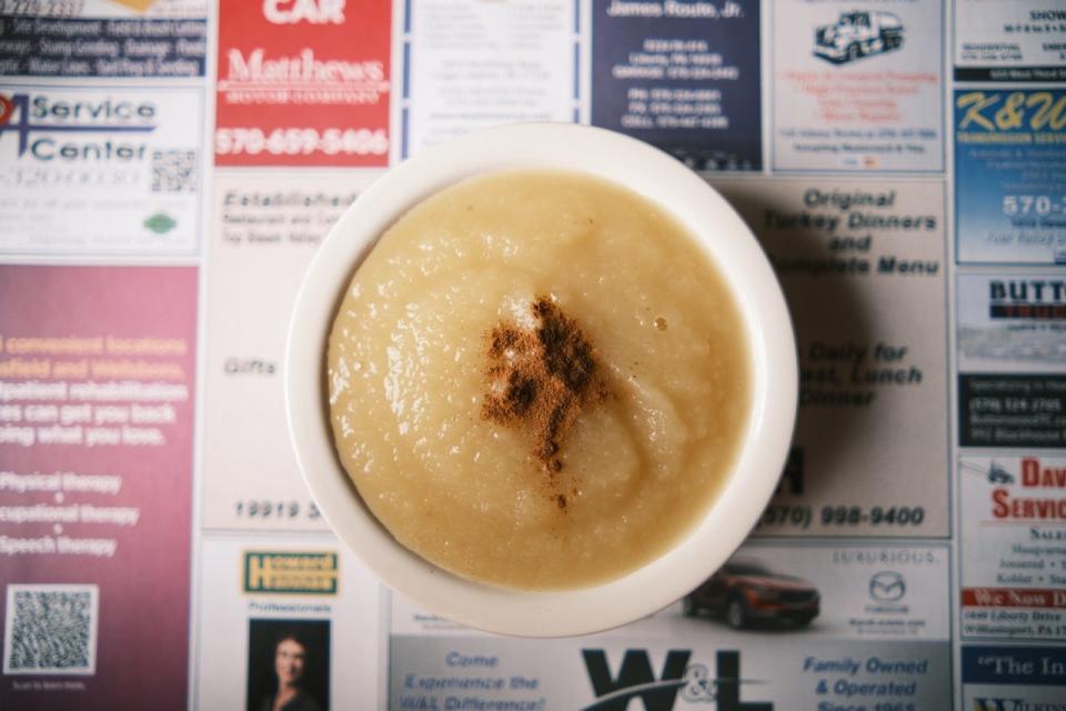 Applesauce on top of a placemat