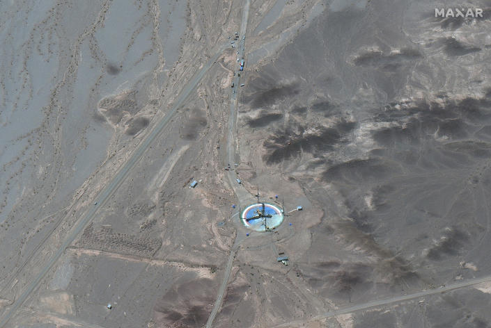 This satellite image from Maxar Technologies shows an overview of launch pad activity at Imam Khomeini Space Center southeast of Semnan, Iran on Tuesday, June 14, 2022. Iran appeared to be readying for a space launch Tuesday as satellite images showed a rocket on a rural desert launch pad, just as tensions remain high over Tehran's nuclear program. The images from Maxar Technologies showed a launch pad at Imam Khomeini Spaceport in Iran’s rural Semnan province, the site of frequent recent failed attempts to put a satellite into orbit. (Satellite image ©2022 Maxar Technologies via AP)