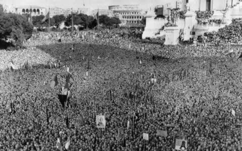 Crowds gathered for Mussolini’s speech announcing Italy’s entry into the war, Piazza Venezia, Rome, 1940  - Credit: Getty images