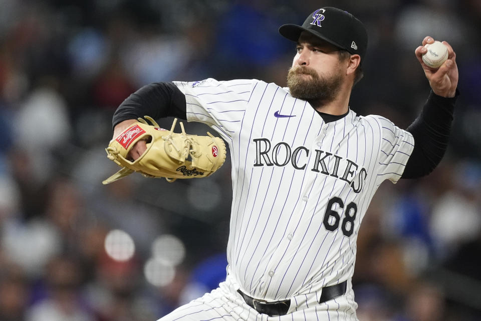 Colorado Rockies relief pitcher Jalen Beeks works against the Texas Rangers in the ninth inning of a baseball game Friday, May 10, 2024, in Denver. (AP Photo/David Zalubowski)