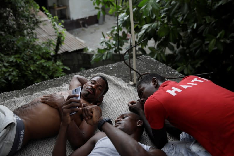 The Wider Image: Haiti's cyclists brave protests and poor roads in race for gold