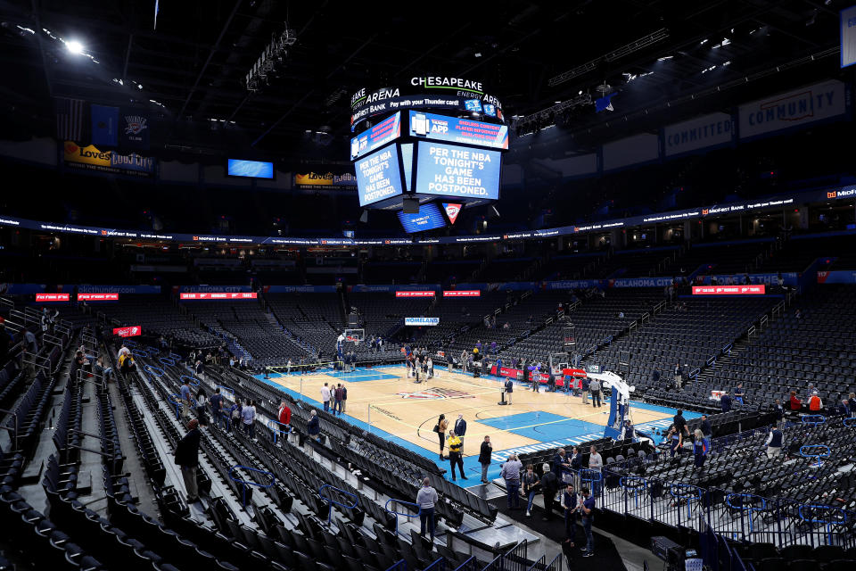 Mar 11, 2020; Oklahoma City, Oklahoma, USA; Fan leave after an announcement that the Oklahoma City Thunder vs. Utah Jazz game is canceled just before the tip off at Chesapeake Energy Arena. Mandatory Credit: Alonzo Adams-USA TODAY Sports      TPX IMAGES OF THE DAY