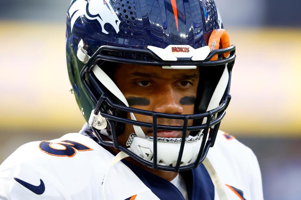 Russell Wilson #3 of the Denver Broncos warms up before the game against the Los Angeles Chargers at SoFi Stadium on December 10, 2023 in Inglewood, California.