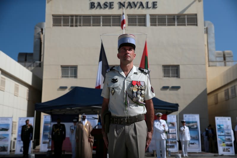 A member of the French Armed Forces takes part in a military cermony at the French Naval Base in Abu Dhabi