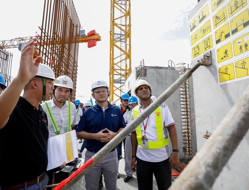 Minister of State for Manpower Zaqy Mohamad (dark blue shirt) announced that his ministry will be stepping up inspections following a spate of workplace deaths in November 2019. (PHOTO: Zaqy Mohamad/Facebook)