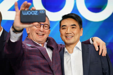 Eric Yuan, CEO of Zoom Video Communications poses for a photo after he took part in a bell ringing ceremony at the NASDAQ MarketSite in New York, New York, U.S., April 18, 2019. REUTERS/Carlo Allegri