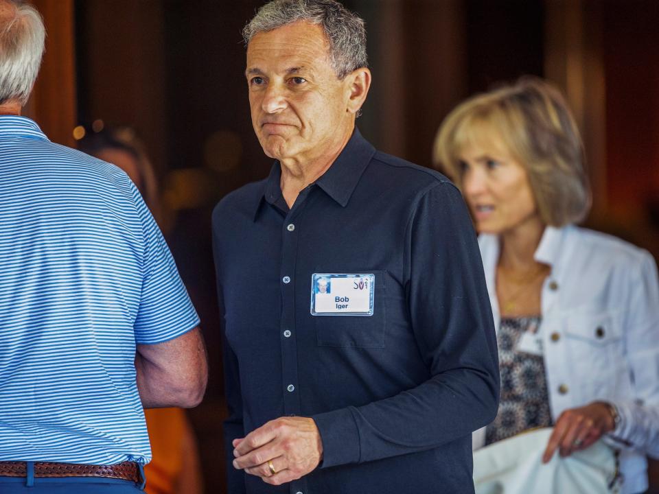 Bob Iger walks into Sun Valley Lodge