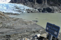 FILE - This May 9, 2020 file photo shows the Mendenhall Glacier in Juneau, Alaska. As glaciers melt and pour massive amounts of water into nearby lakes, 15 million people across the globe live under the threat of a sudden and deadly outburst flood, a new study finds. (AP Photo/Becky Bohrer, File)