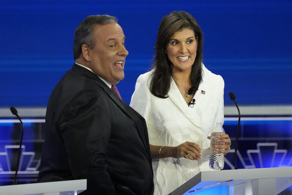Republican presidential candidates former U.N. Ambassador Nikki Haley talks with former New Jersey Gov. Chris Christie during a break at the Republican presidential primary debate hosted by NBC News, Wednesday, Nov. 8, 2023, at the Adrienne Arsht Center for the Performing Arts of Miami-Dade County in Miami. (AP Photo/Rebecca Blackwell)
