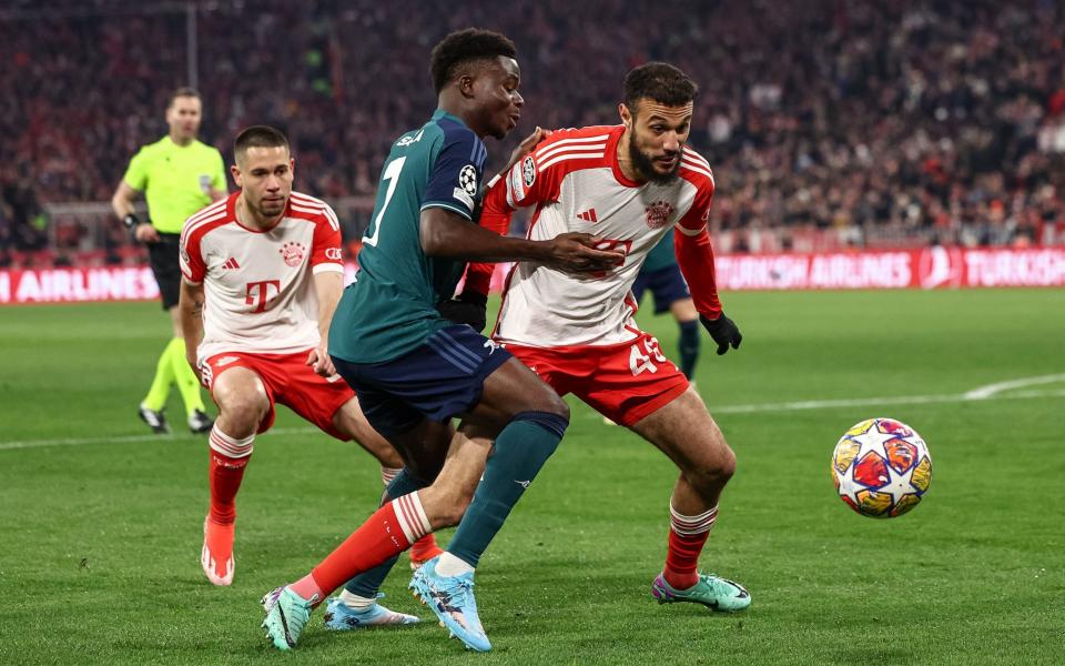 Bukayo Saka playing for Arsenal in their Champions League defeat at Bayern Munich