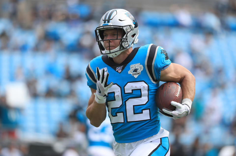 Panthers blue jersey and silver helmet