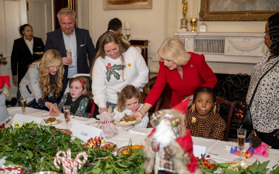 Eleven children were treated to sausages and mash followed by cookies - PA