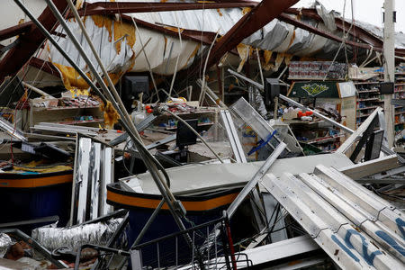 Damages are seen in a supermarket after the area was hit by Hurricane Maria in Guayama, Puerto Rico September 20, 2017. REUTERS/Carlos Garcia Rawlins