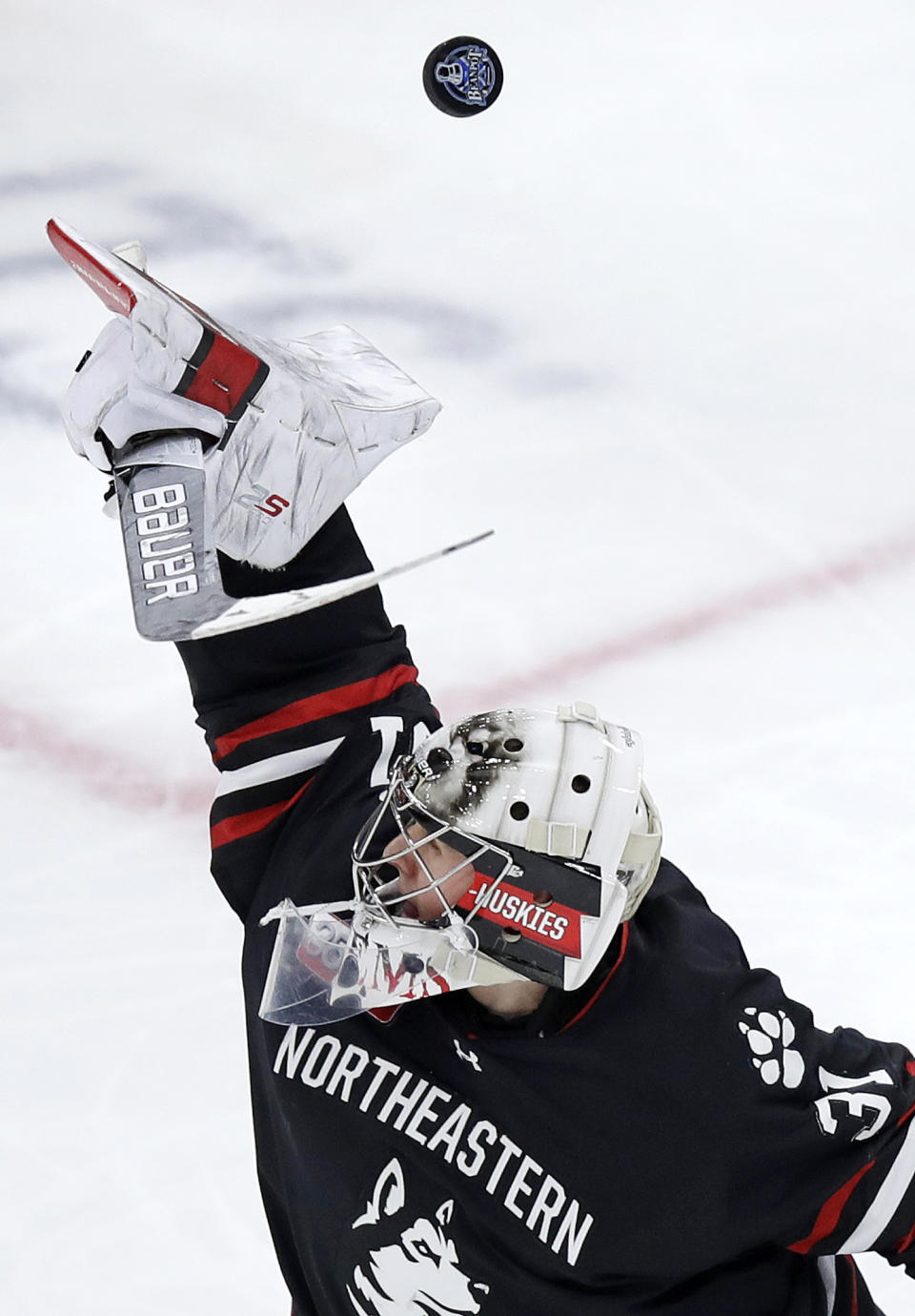 Northeastern goaltender Cayden Primeau makes a save during the second period of the NCAA hockey Beanpot tournament championship game against Boston College in Boston, Monday, Feb. 11, 2019. (AP Photo/Charles Krupa)