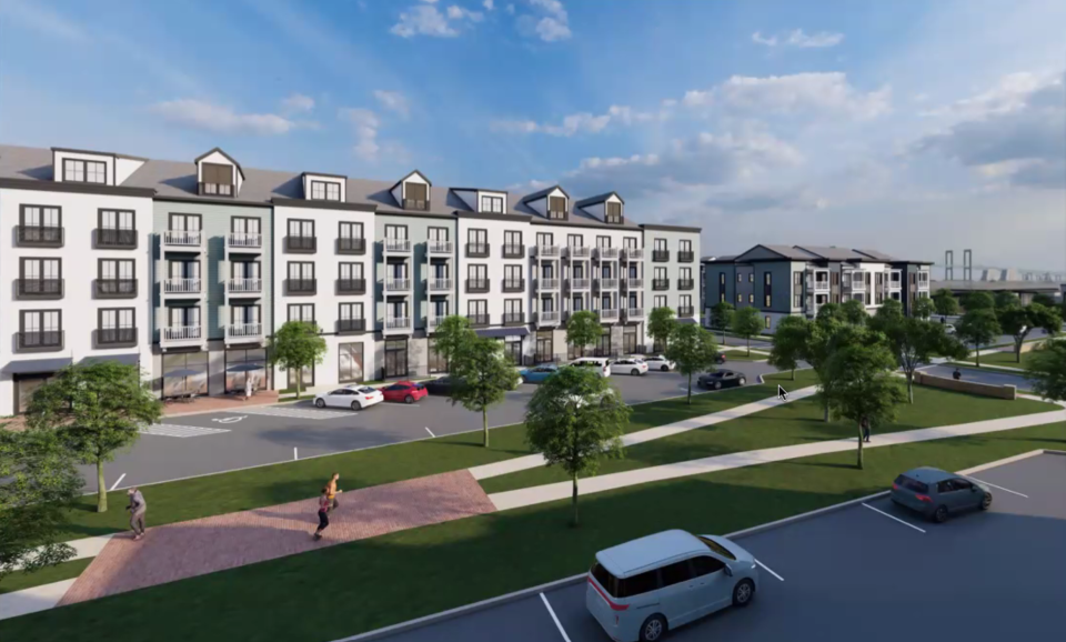 A rendering of the apartment buildings in the proposed Flats at Riveredge development in New Castle. In the preliminary plans, retail is located on the ground floor to the left and residential access is located on the ground floor to the right.