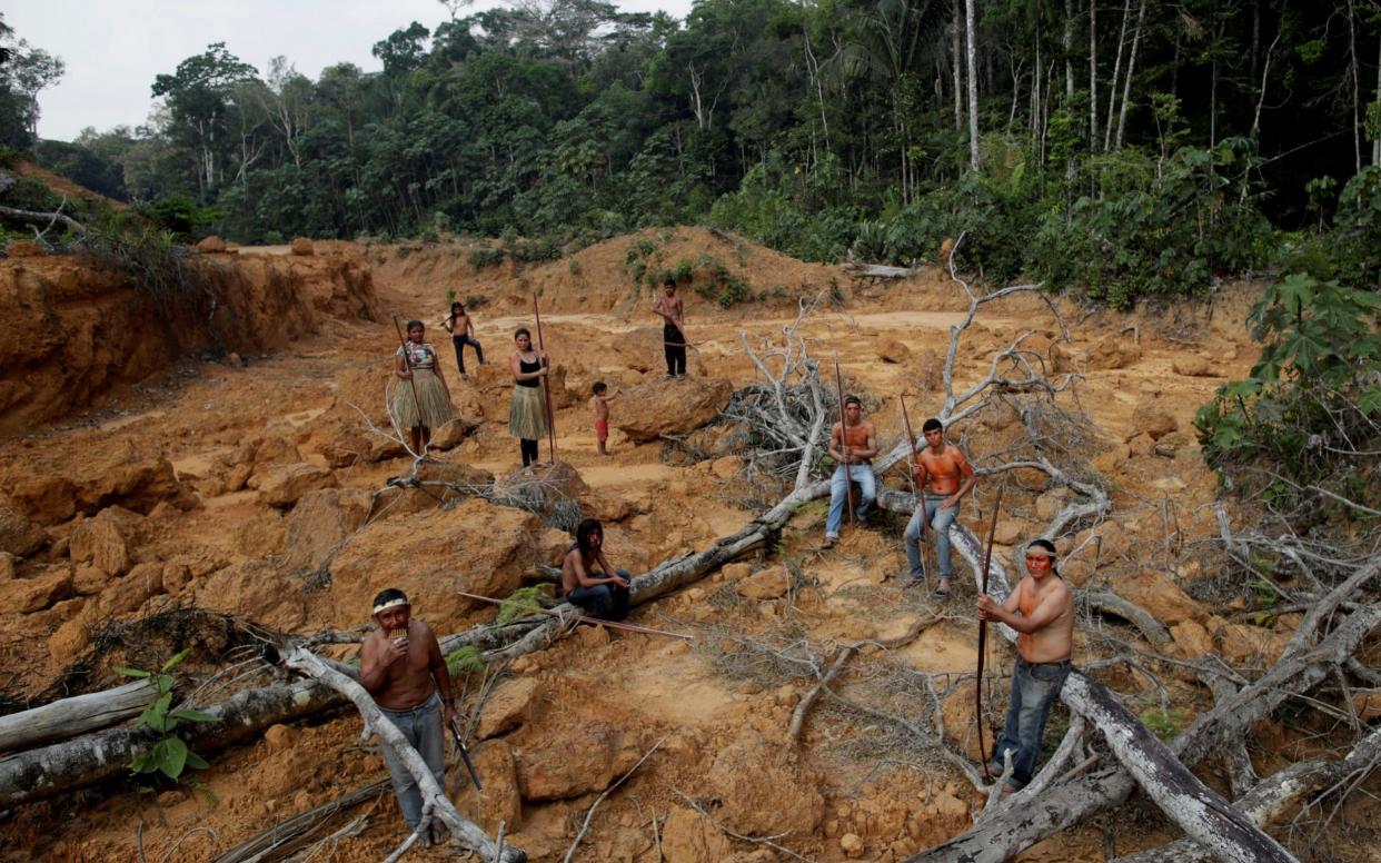 Mr Bolsonaro has decried the fact that 15 per cent of Brazil’s territory is reserved for indigenous tribes - REUTERS