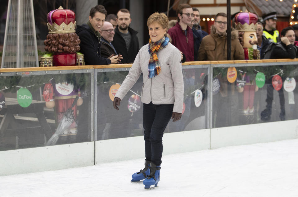 SNP leader Nicola Sturgeon ice skates during a visit to the Aberdeen Christmas Market in The Quad, Marischal College, on the General Election campaign trail. PA Photo. Picture date: Saturday December 7, 2019. See PA story POLITICS Election Sturgeon. Photo credit should read: Jane Barlow/PA Wire