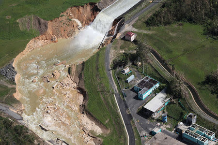 An aerial view shows the damage to the Guajataca dam in the aftermath of Hurricane Maria, in Quebradillas, Puerto Rico September 23, 2017. REUTERS/Alvin Baez