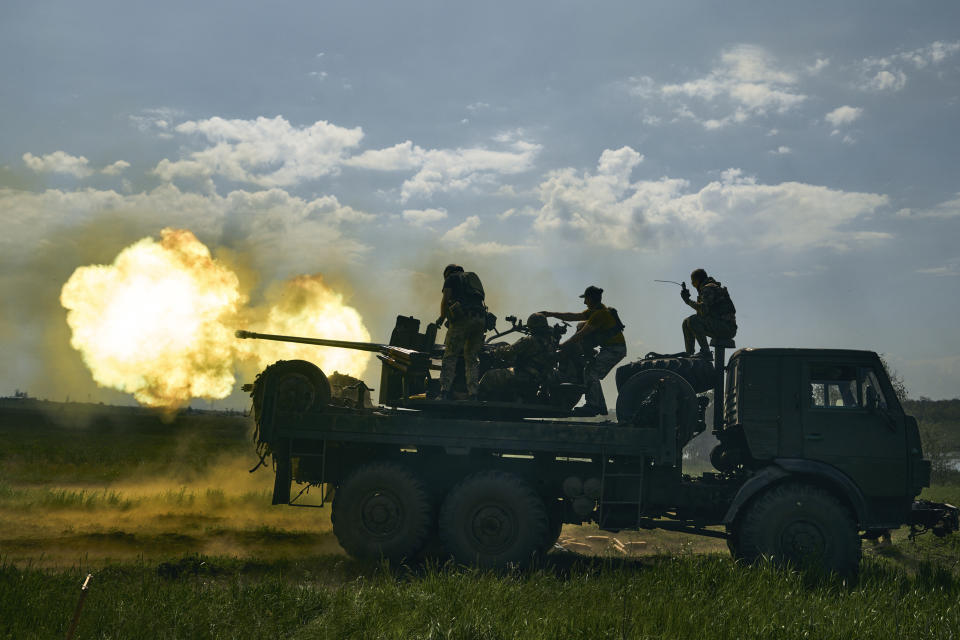 Ukrainian soldiers fire a cannon near Bakhmut on Monday, May 15, 2023. The city in eastern Ukraine’s Donetsk region was the scene of long and fierce battles between Ukrainain and Russian forces. Analysts say Moscow has learned from its mistakes so far in Ukraine and has improved its weapons and skills. (AP Photo/Libkos, File)