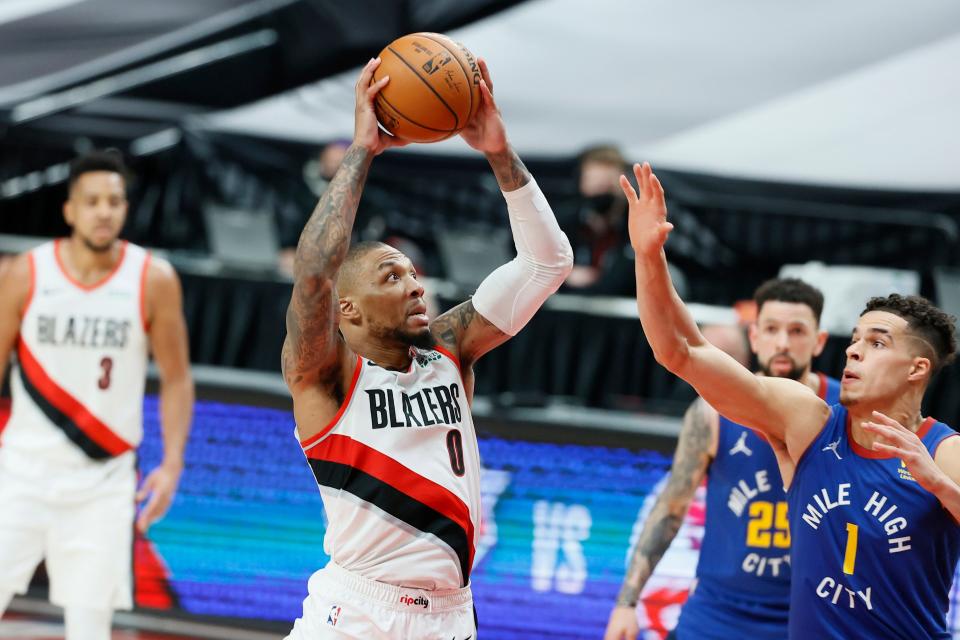 Portland Trail Blazers point guard Damian Lillard (0)