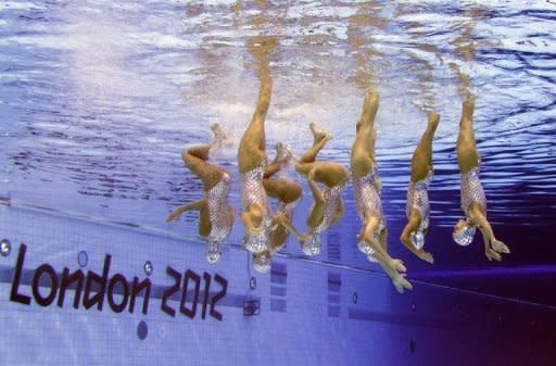 Spain's Irene Montruchhio Beuas, Spain's Paula Klamburg Roque, Spain's Andrea Fuentes Fache, Spain's Margalida Crespi Jaume, Spain's Clara Basiana Canellas, Spain's Ona Carbonell Ballestero, Spain's Alba Cabello Rodilla and Spain's Thais Henriquez Torres compete in the team free routine final in the synchronised swimming competition at the London 2012 Olympic Games on August 10, 2012 in London