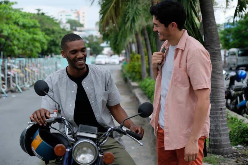 Parker Sawyer, left, and Henry Golding in the movie "Monsoon."