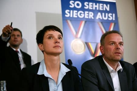 Frauke Petry, chairwoman of the anti-immigration party Alternative for Germany (AfD), and Leif-Erik Holm (R), Mecklenburg-Vorpommern top candidate attend a news conference in Berlin, Germany, September 5, 2016. REUTERS/Stefanie Loos