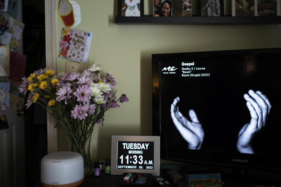 Gospel music is played on a television in Constance Guthrie's bedroom in Fredericksburg, Va., on Tuesday, Sept. 20, 2022. (AP Photo/Wong Maye-E)