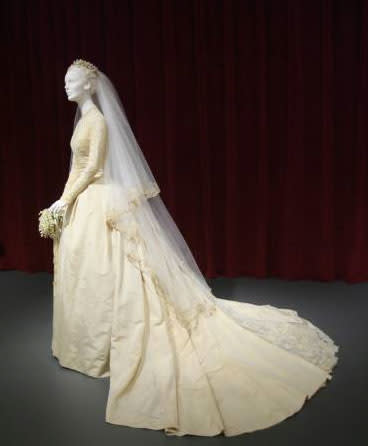 Kelly married Prince Rainier in 1956 wearing this silk, lace, and taffeta confection by MGM wardobe designer Helen Rose. It has a comparatively cropped train.