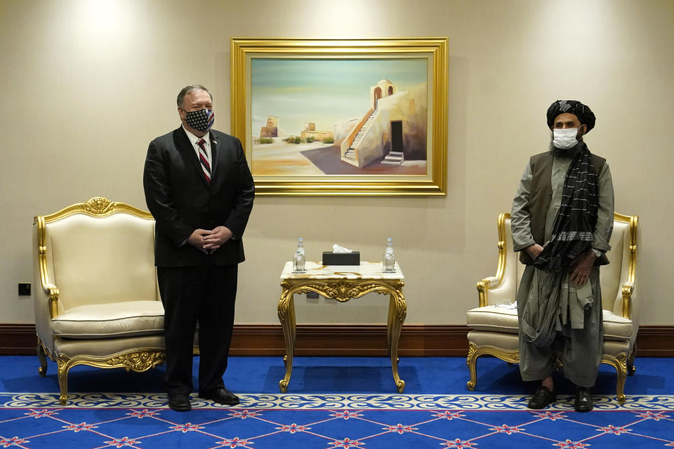 Secretary of State Mike Pompeo meets with Mullah Abdul Ghani Baradar, head of the Taliban's peace negotiation team, amid talks between the Taliban and the Afghan government in November. 