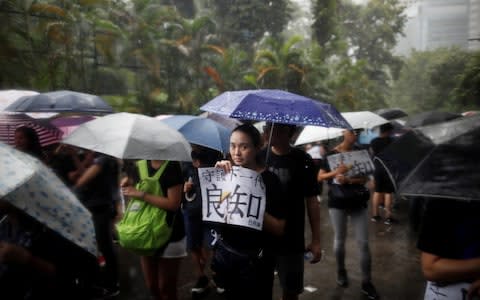 Teachers protest against the extradition bill during a rally organised by Hong Kong Professional Teachers' Union in Hong Kong - Credit: Kim Hong-Ji/Reuters