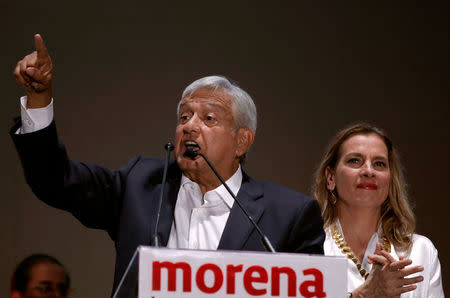 Mexico's next President Andres Manuel Lopez Obrador addresses supporters next to his wife Beatriz Gutierrrez Muller, in Mexico City, Mexico July 2, 2018. REUTERS/Alexandre Meneghini