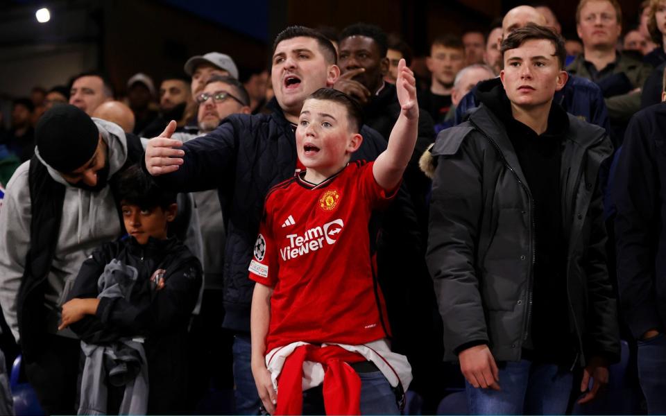 Fans of Manchester United react during the Premier League match between Crystal Palace and Manchester United