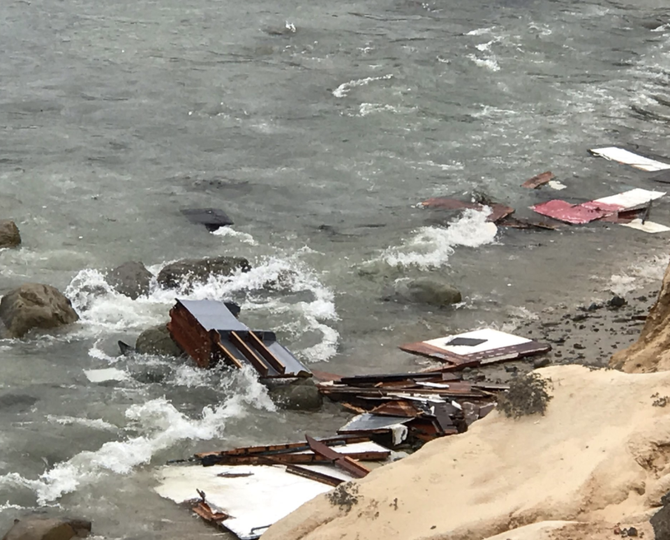 Debris is seen floating in the water near off Cabrillo National Monument at California's Point Loma.