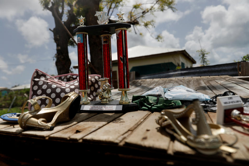 <p>A trophy and other items are seen on the remains of a home at Codrington on the island of Barbuda just after a month after Hurricane Irma struck the Caribbean islands of Antigua and Barbuda, October 7, 2017. REUTERS/Shannon Stapleton </p>