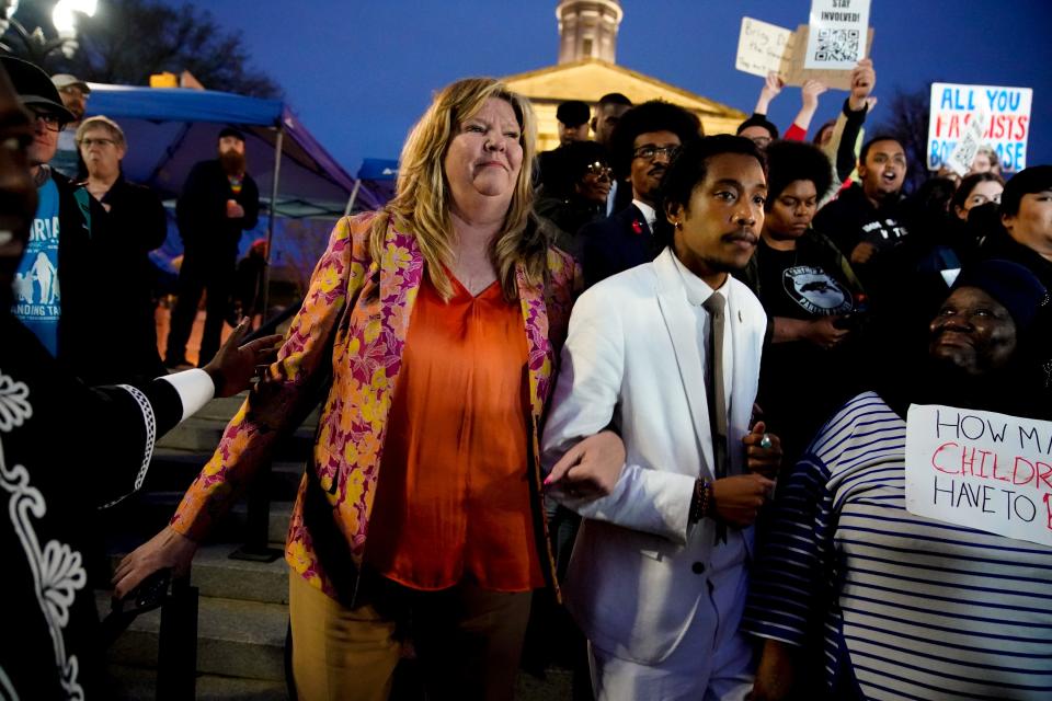 Gloria Johnson joins Justin Jones and Justin Pearson after the two men were expelled from the House of Representatives at the State Capitol in Nashville, Tenn., on Thursday, April 6, 2023. 