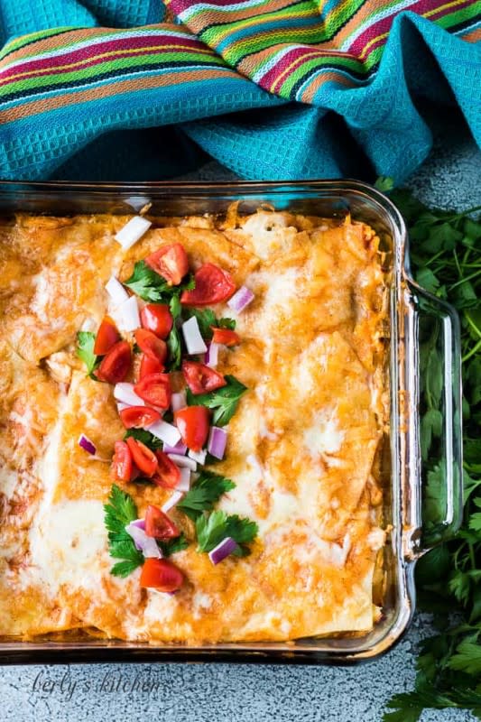 <p>Berly's Kitchen</p><p>This is an easy 6-ingredient layered chicken enchilada casserole recipe your family will love.</p><p><strong>Get the recipe: <a href="https://www.berlyskitchen.com/easy-enchilada-casserole/" rel="nofollow noopener" target="_blank" data-ylk="slk:Easy Enchilada Casserole;elm:context_link;itc:0;sec:content-canvas" class="link rapid-noclick-resp">Easy Enchilada Casserole</a></strong></p>