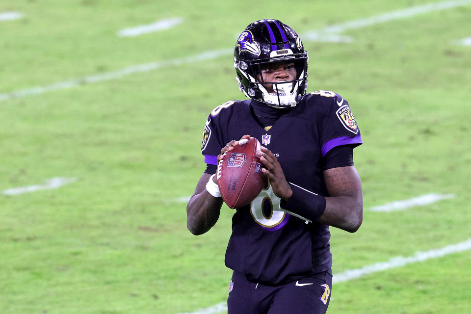 The Ravens are being fined $250,000 for their late November COVID-19 outbreak, which affected 23 players including quarterback Lamar Jackson. (Photo by Rob Carr/Getty Images)