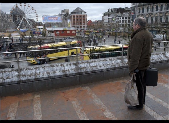 Gunman Nordine Armani kills three people, including a 17-month-old toddler, and wounds 121 in a central square in the eastern city of Liege, before shooting himself. The next day Belgian investigators find the body of a woman in warehouse used by the gunman raising the death toll, including the killer, to five.<br>  <em>Caption: People mourn at Place Saint Lambert on December 14, 2011, in Liege, Belgium. (Christophe Licoppe/Photonews via Getty Images)</em>