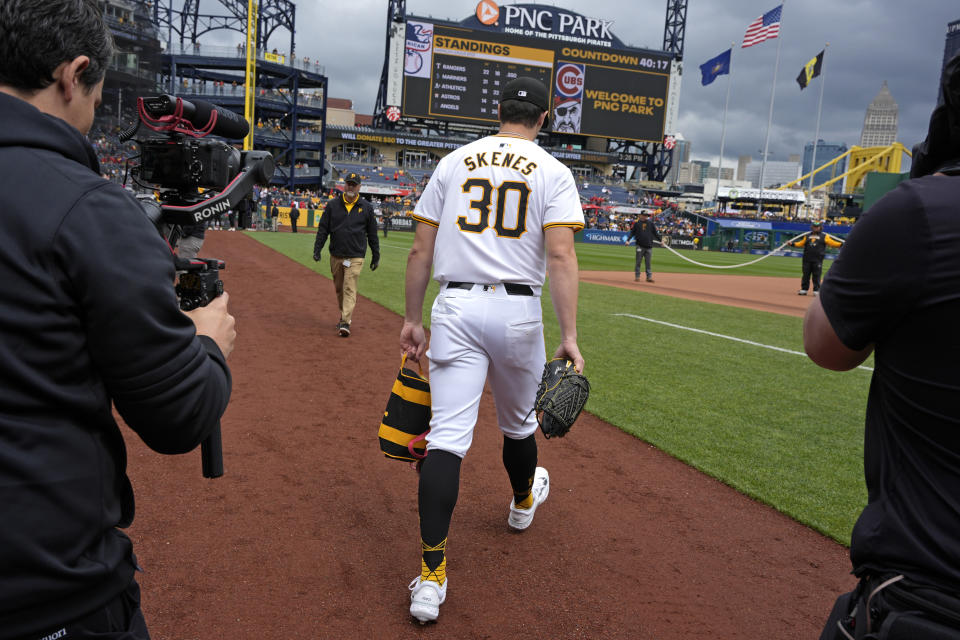 Pittsburgh Pirates starting pitcher Paul Skenes heads to the bullpen to warm up for his major league debut before a baseball game against the Chicago Cubs in Pittsburgh, Saturday, May 11, 2024. (AP Photo/Gene J. Puskar)