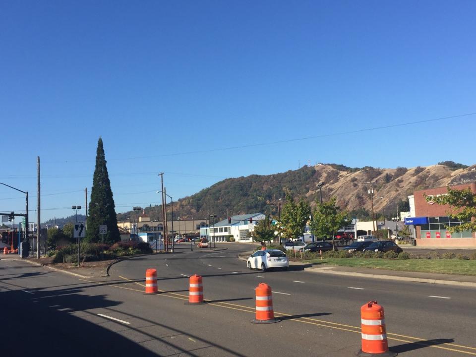 Downtown Roseburg, though small and rural, has come under intense media spotlight in the past 24 hours, and the roads are lined with TV trucks waiting for press conferences and interviews.