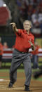 Former President George W. Bush throws out the ceremonial first pitch before Game 4 of baseball's World Series between the St. Louis Cardinals and the Texas Rangers Sunday, Oct. 23, 2011, in Arlington, Texas. (AP Photo/Tony Gutierrez)