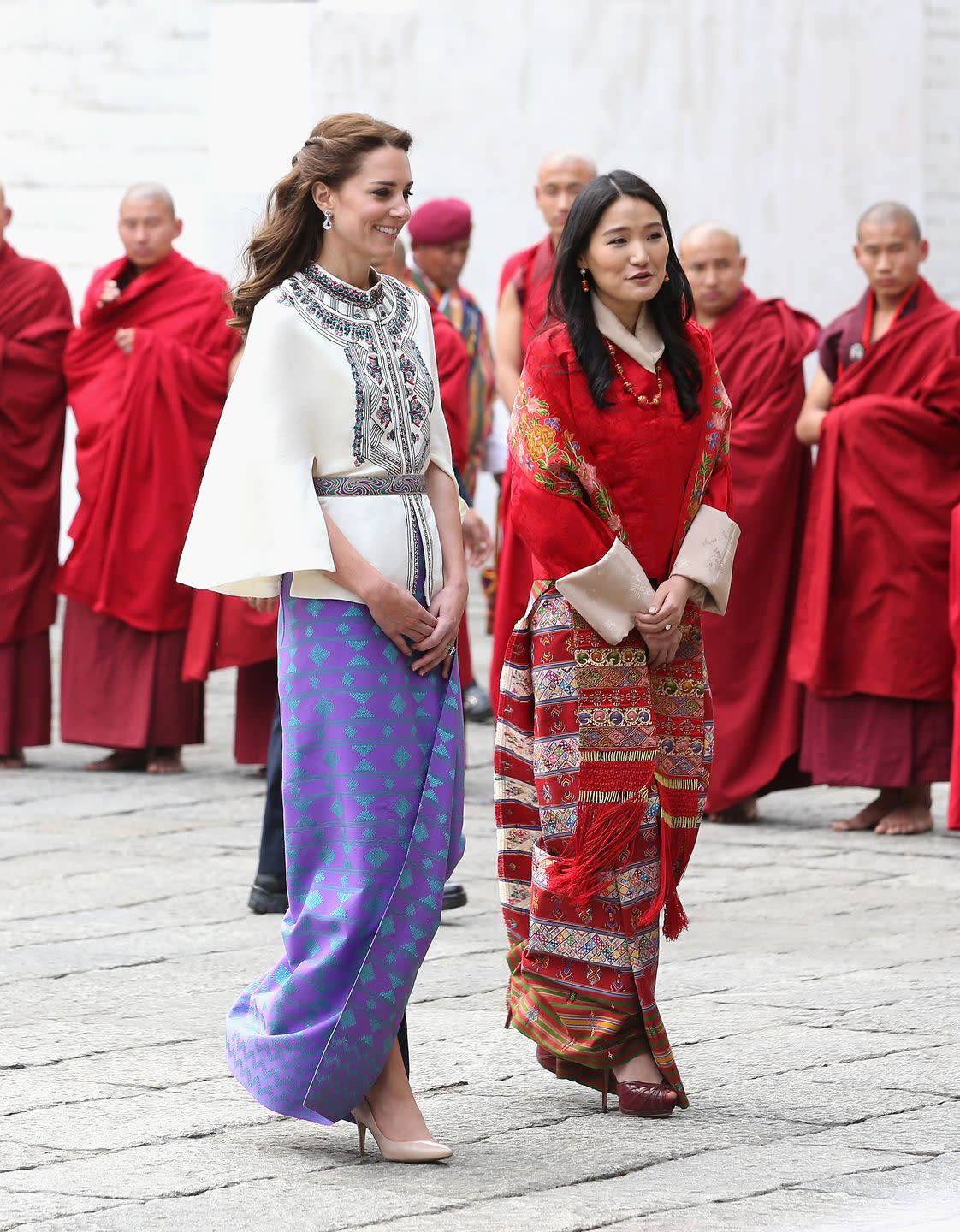 thimphu, bhutan april 14 catherine, duchess of cambridge walks with hm jetsun pema wangchuck in front of monks in the tashichhodzong fortress on the first day of a two day visit to bhutan on the 14th april 2016 in paro, bhutan the royal couple are visiting bhutan as part of a week long visit to india and bhutan that has taken in cities such as mumbai, delhi, kaziranga, bhutan and agra photo by chris jacksongetty images