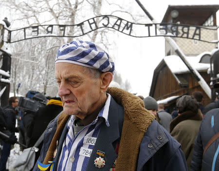 Igor Malicki of Ukraine, a survivor of the former German Nazi concentration and extermination camp Auschwitz reacts as he visits the camp in Oswiecim January 26, 2015. REUTERS/Laszlo Balogh