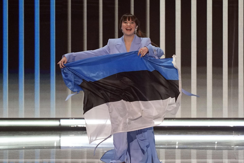 Alika Milova of Estonia during the flag ceremony before during the Grand Final of the Eurovision Song Contest in Liverpool, England, Saturday, May 13, 2023. (AP Photo/Martin Meissner)